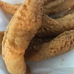 Fish wasn't bad, golden brown but could use a little more seasoning and workers touched fish without gloves unsanitary