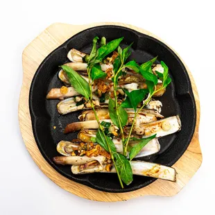 a plate of grilled scallops