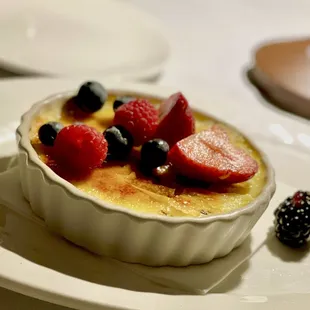 a dessert with berries on a plate