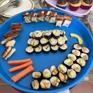 Made California rolls, salmon and avocado rolls, unagi nigiri and dragon rolls