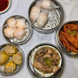 a variety of asian food in bowls