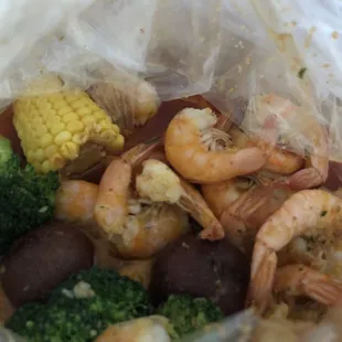 Shrimp no head 1/2 Lb with corn, broccoli, and potatoes