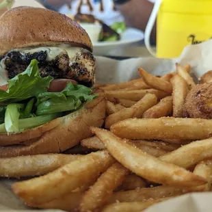 a burger and fries in a basket