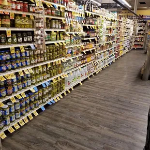 a wide aisle of canned food