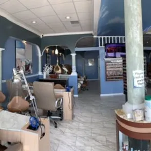 Manicure room with TV and reception area