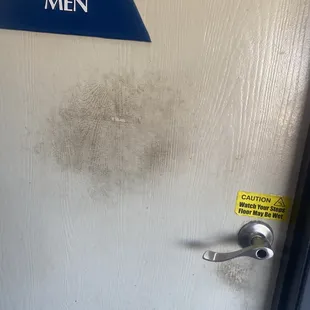 Filthy bathroom door