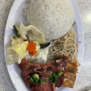 64. Rice with Shredded Pork Skin, Egg Cake and Charbroiled Pork Chop.