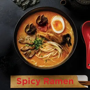 spicy ramen in a bowl with chopsticks
