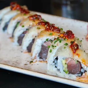 The Ocean Roll was made with #1 Tuna, Salmon, Hamachi, Avocado, &amp; Chili Garlic Oil.