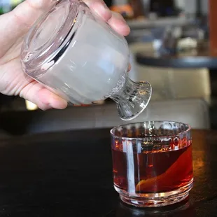 The old fashioned was served from a decanter and poured into an etched highball glass. In that glass was a pristine 2x2 Ocean Prime ice cube
