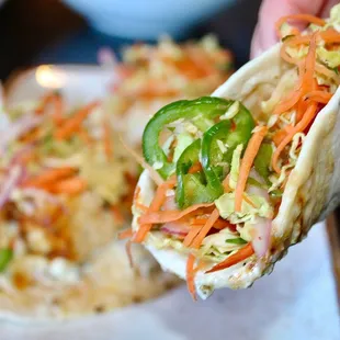 The sea bass in the taco was buttery in taste and texture while the slaw, tartar sauce, and lime added acidity and brightness to every bite.