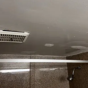 Poor patch work on the bathroom ceiling