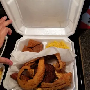 Seafood platter A. Fish, scallops,shrimp &amp; crab cake. Comes with hush puppies and two sides.