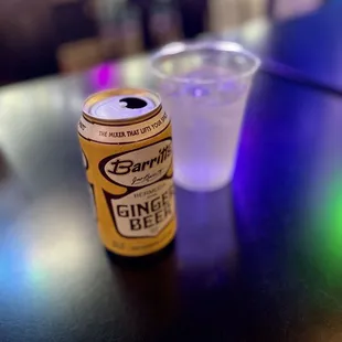 a can of beer on a table