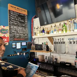 a man reading a menu