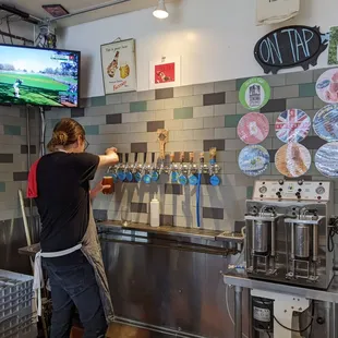a man working in a coffee shop