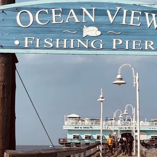 people walking on the pier