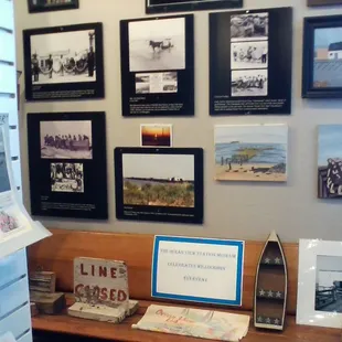 More photo wall displays with a model boat below to pique your interest even furlther