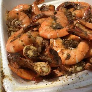 a plate of cooked shrimp