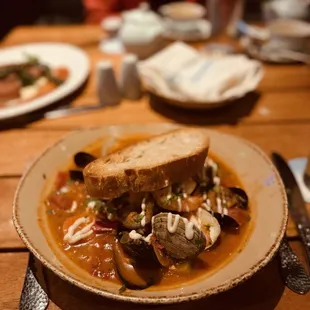 a plate of food on a wooden table