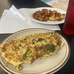 Meat Lovers Omelette with extra veggies.