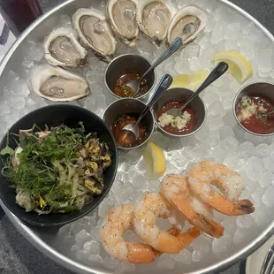 Oysters, jumbo shrimp, seafood salad