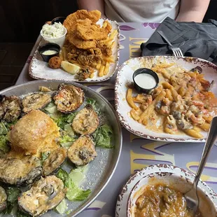 Famous oysters, seafood platter, Cajun fries, a side of crawfish Étouffée.