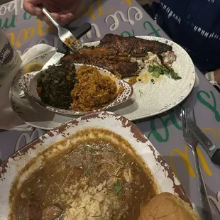 Bowl of Gumbo and blackened red fish with jambalaya.