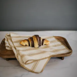 Croissants with a unique chocolate twist!

Flaky, light with a subtle chocolate folded throughout