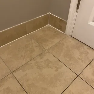 In between the tiles are supposed to be white I guess.... Ew