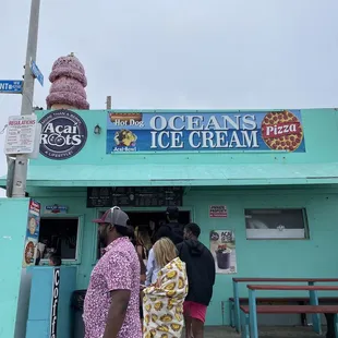 It clearly says on the sign Pizza! If you only want to sell ice cream then change your sign!