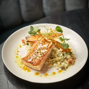 Faroe Island Salmon | Cauliflower couscous, almonds, currants, crispy salsify. ​