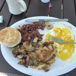 House made corned beef with two eggs, home fries and a biscuit