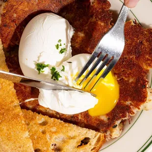 Maryland Breakfast. Our Housemade Corned Beef &amp; Potatoes with Poached Eggs &amp; Your Choice of Toast.