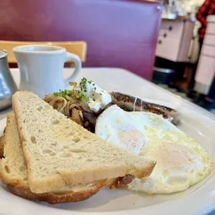Fried eggs, potatoes, chicken apple sausages