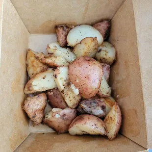 Side of home fries, added salt pepper and hot sauce and was super tasty, perfectly cooked.