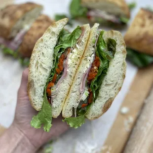 Guyute Sandwich * Prosciutto, Italian Cheeses, Tomato, Peppadew Peppers, Scallions, Lettuce