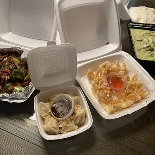 Pad see ew, steamed dumplings, cream cheese rolls, green curry with rice.