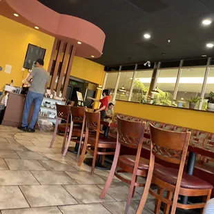 a woman sitting at a table