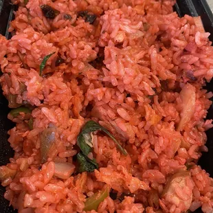 The most neon basil chicken fried rice I've ever seen. Threw it away as it looked unappetizing.