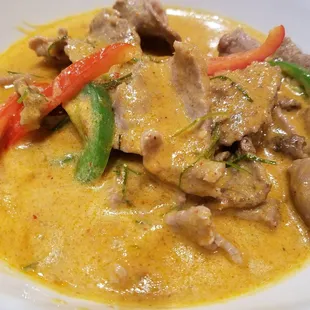 Panang beef curry with dried out, overcooked, tough and chewy beef. Skip
