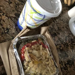 Small cornmeal porridge and a small Callaloo and Cod Fish