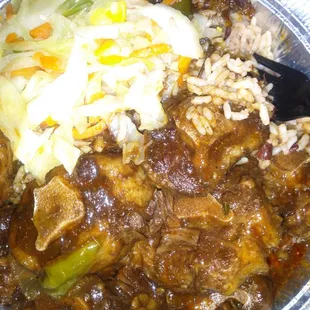 Large oxtails rice and peas cabbage plantain with nuff oxtail gravy $20