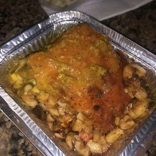 Mac and cheese with oxtail and curry gravy