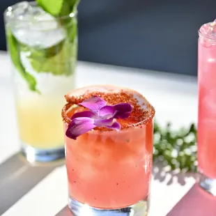 two cocktails on a table