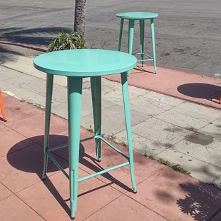 High-top tables out front