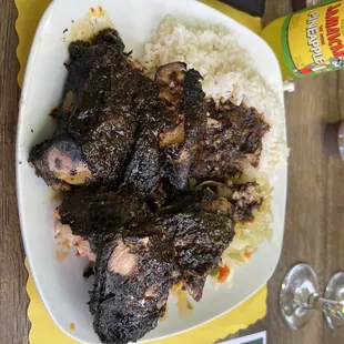 Jerk chicken with white rice and cabbage