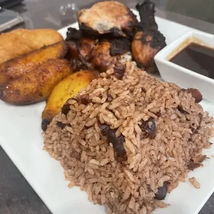 Jerk Chicken plate with rice and beans, plantain