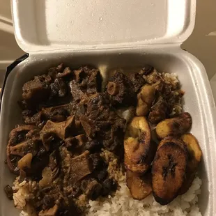 a container of rice and meat