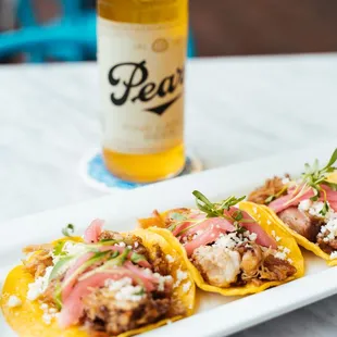 Street tacos with a Pearl beer